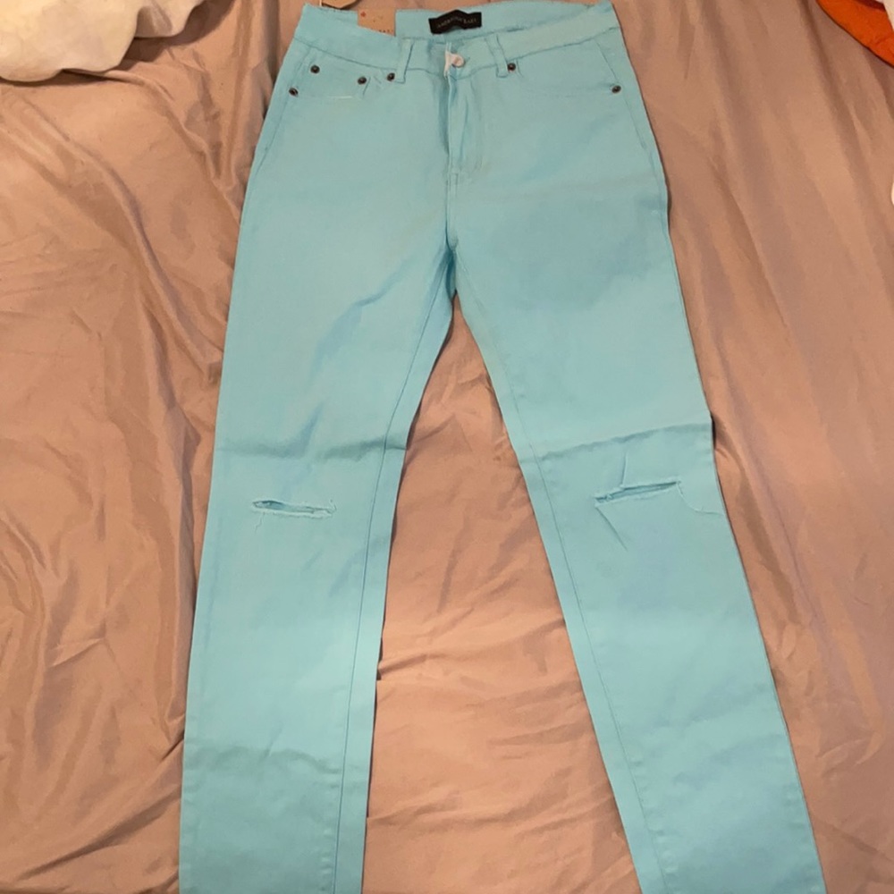Sky blue, high rise skinny,size 9 jeans brand new.